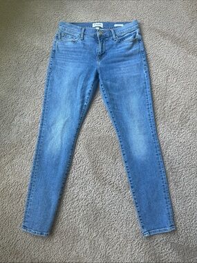 Frame Denim Mid Wash Skinny Jeans in Blue